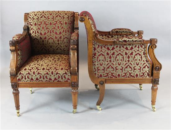 A pair of Victorian style mahogany armchairs, W.2ft 3in. D.2ft 10in H.3ft 4in.